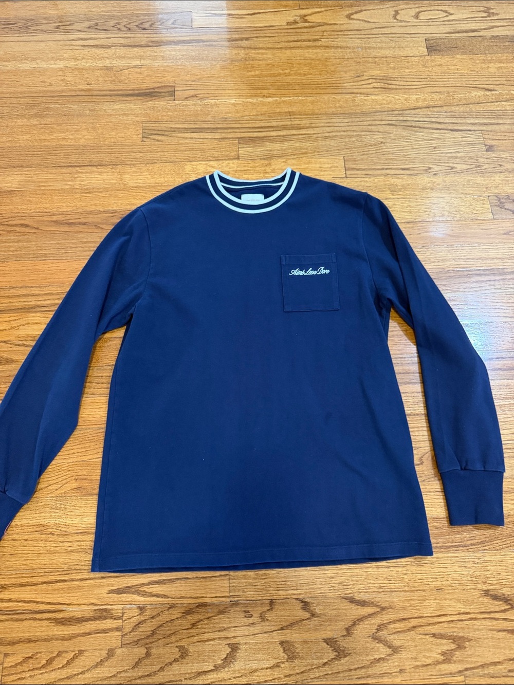 Aime Leon Dore Navy Blue Long Sleeve Pocket Sweatshirt with Cream Trim